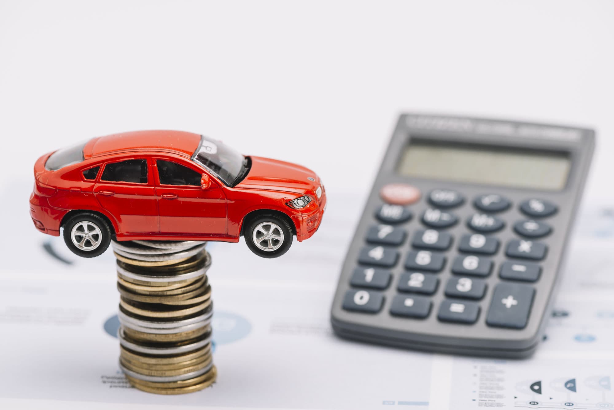 car, coins and calculator